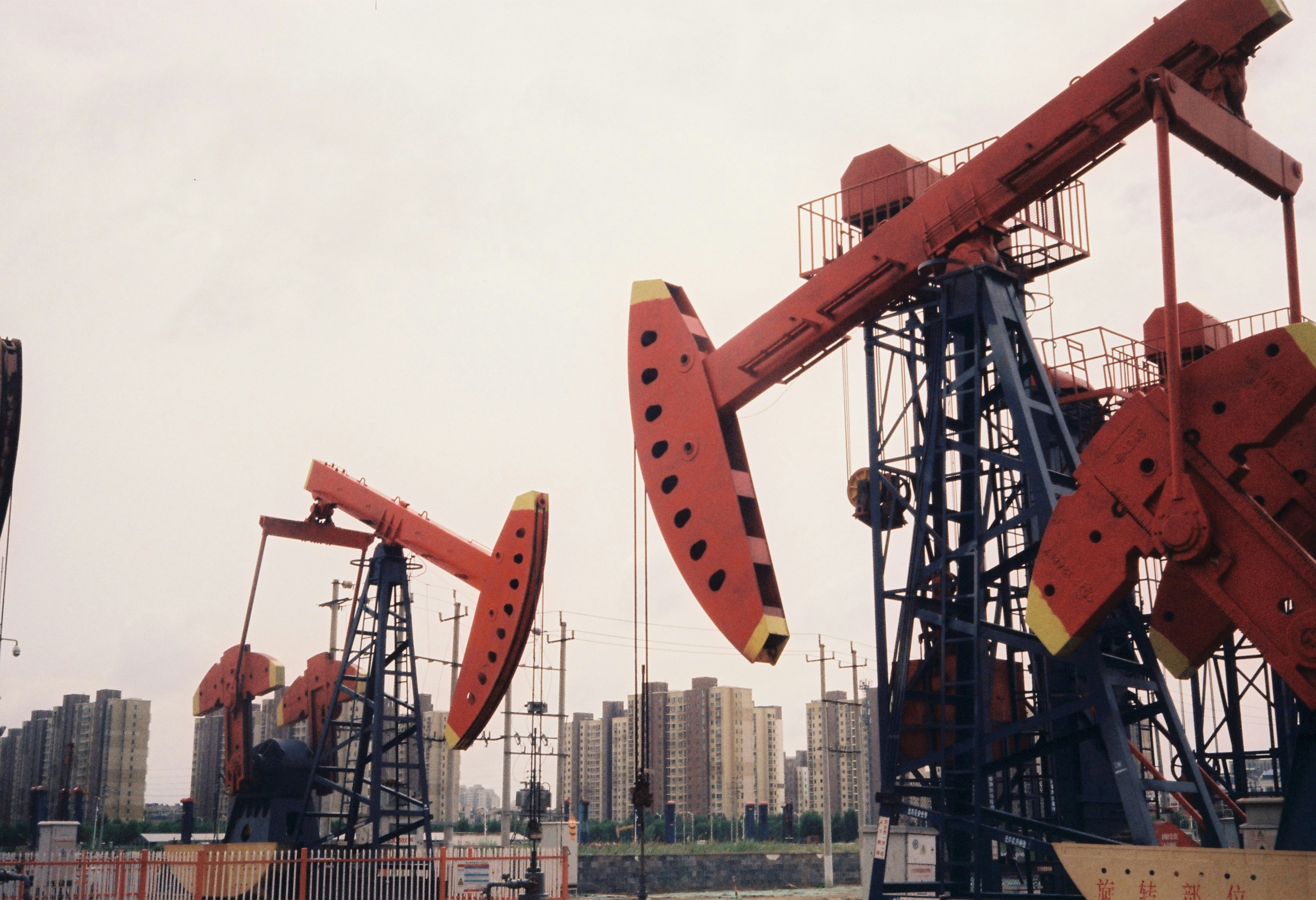 Oil drilling rig and workers